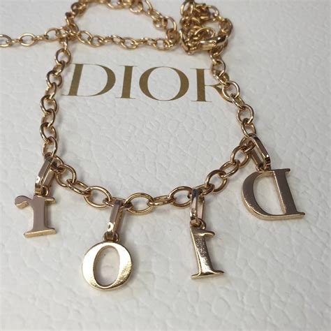 simple dior necklace|Dior letters necklace value.